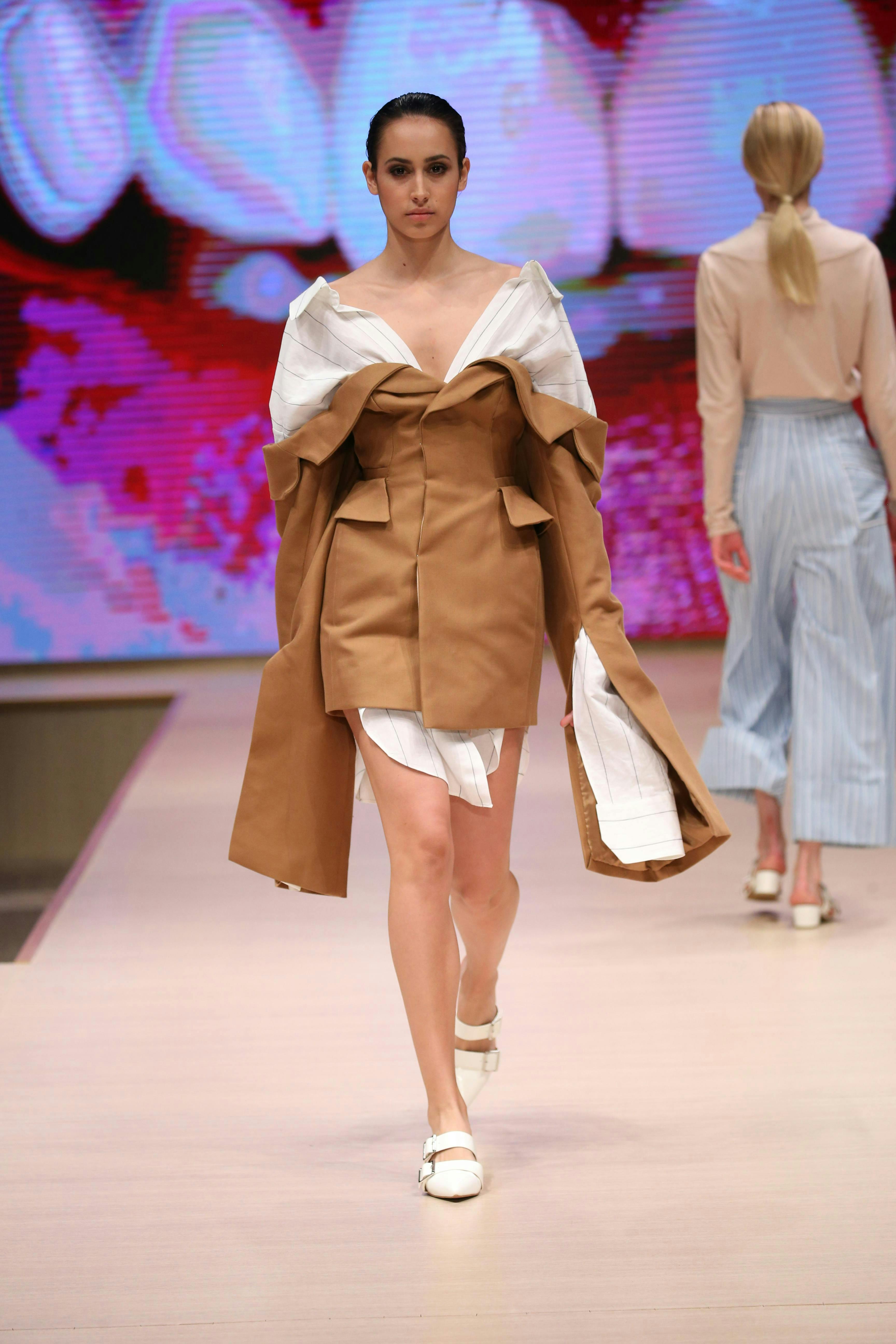 coat clothing apparel person human fashion runway