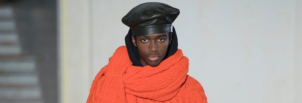 clothing apparel person human helmet scarf