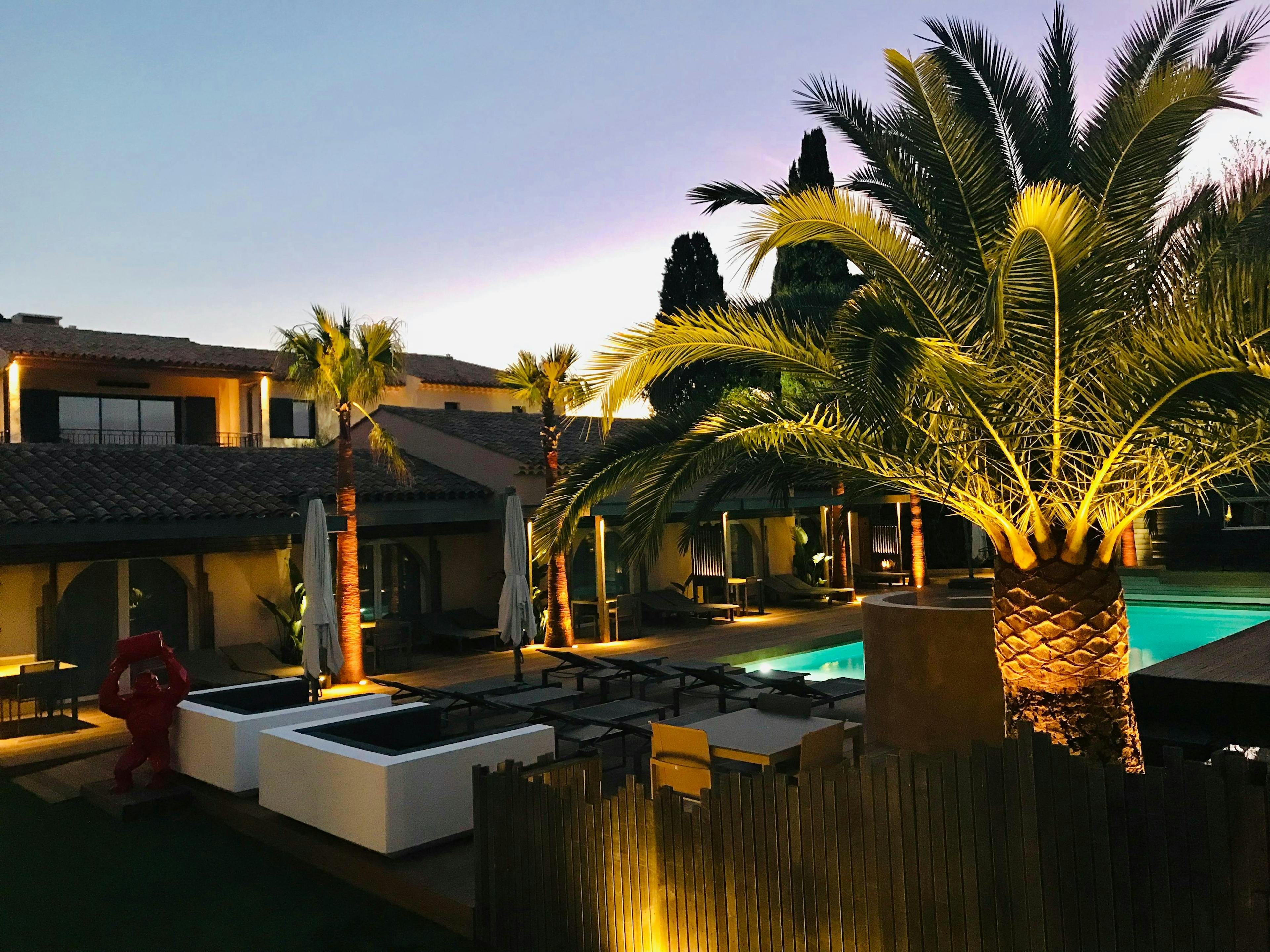 resort building hotel summer palm tree plant arecaceae tree