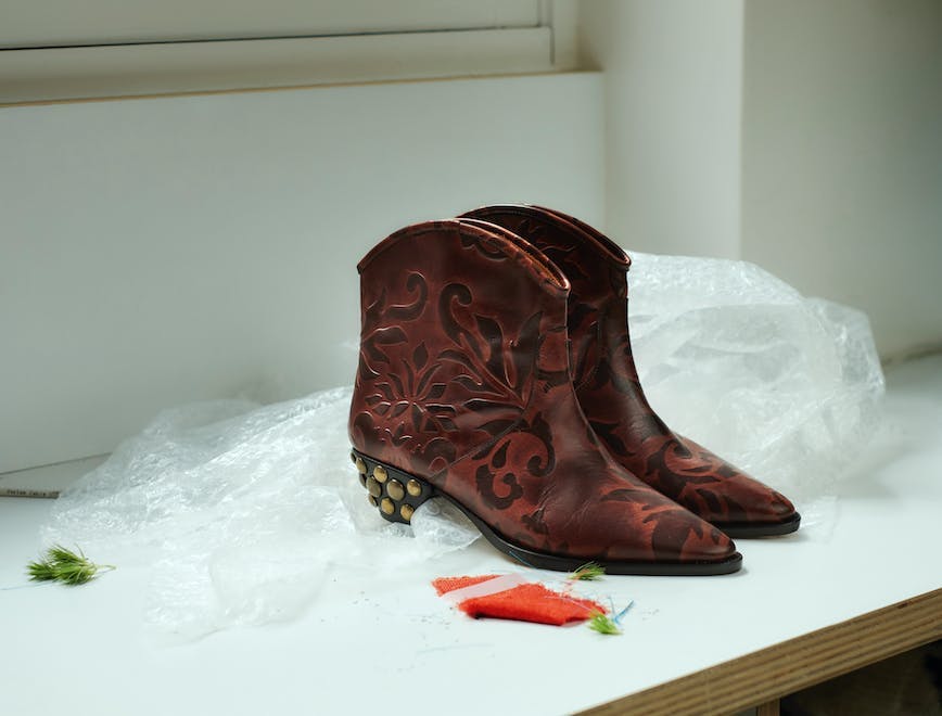 clothing apparel footwear cowboy boot boot shoe