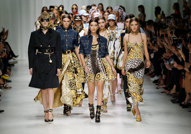 versace ready to wear spring summer 2018 milan fashion week september2017 person human clothing apparel sunglasses accessories accessory coat