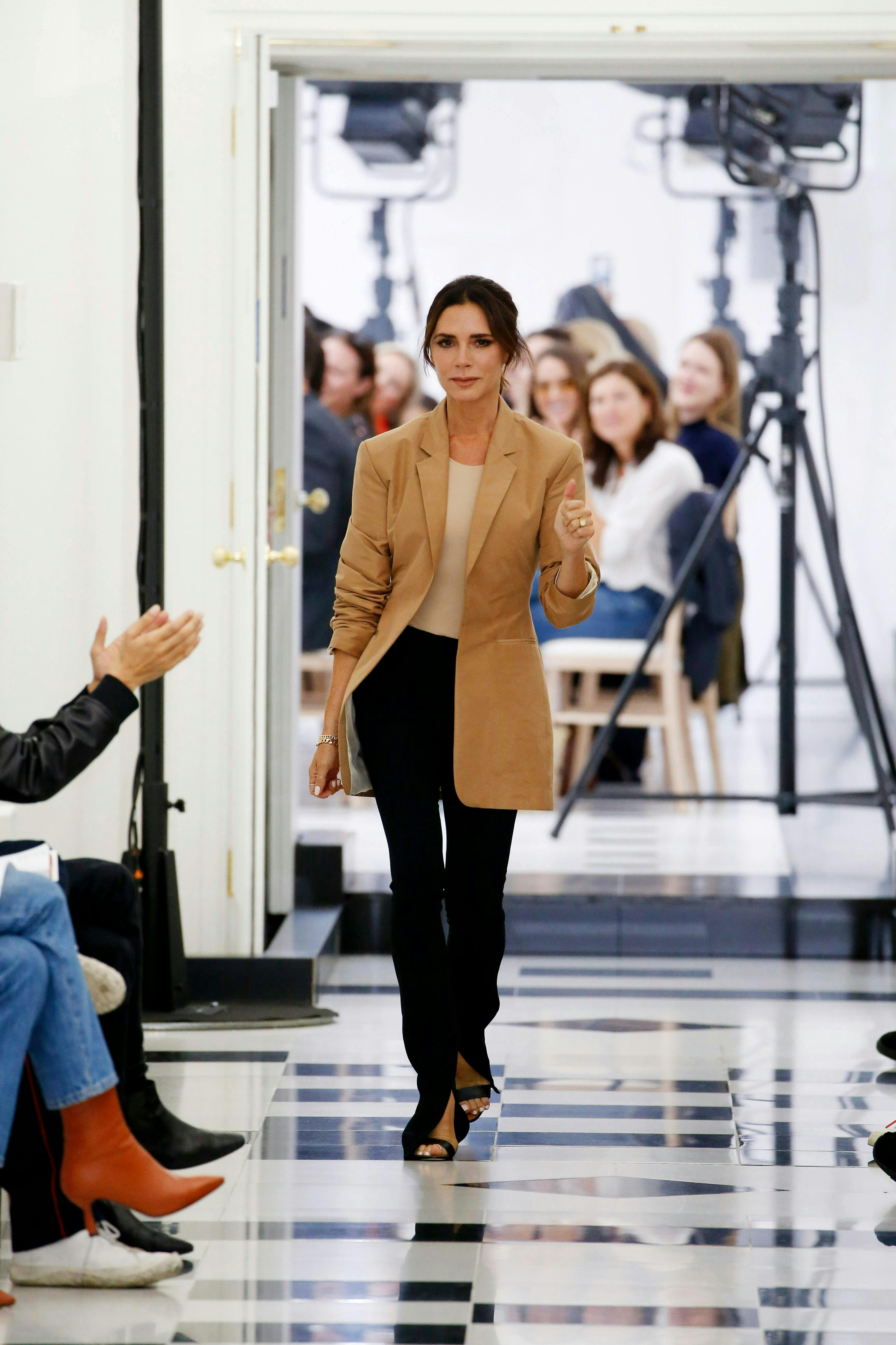 victoria_beckham ready to wear spring summer 2019 london fashion week september 2018 person human clothing apparel long sleeve sleeve tripod