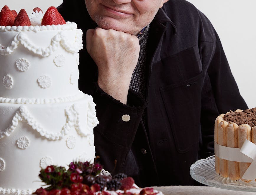 cake dessert food person human icing cream creme birthday cake wedding cake