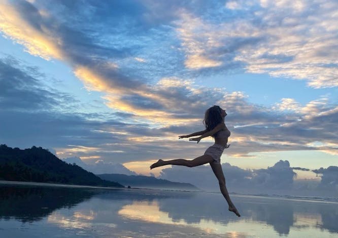 water outdoors nature person human dance pose leisure activities lake silhouette