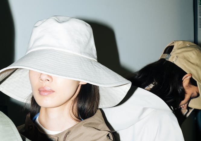 clothing apparel hat sun hat person human