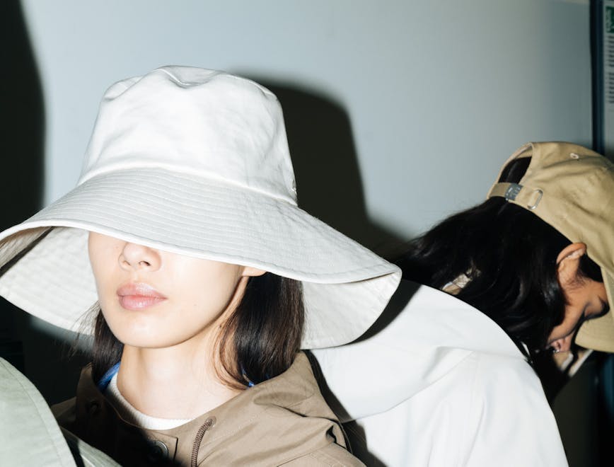 clothing apparel hat sun hat person human