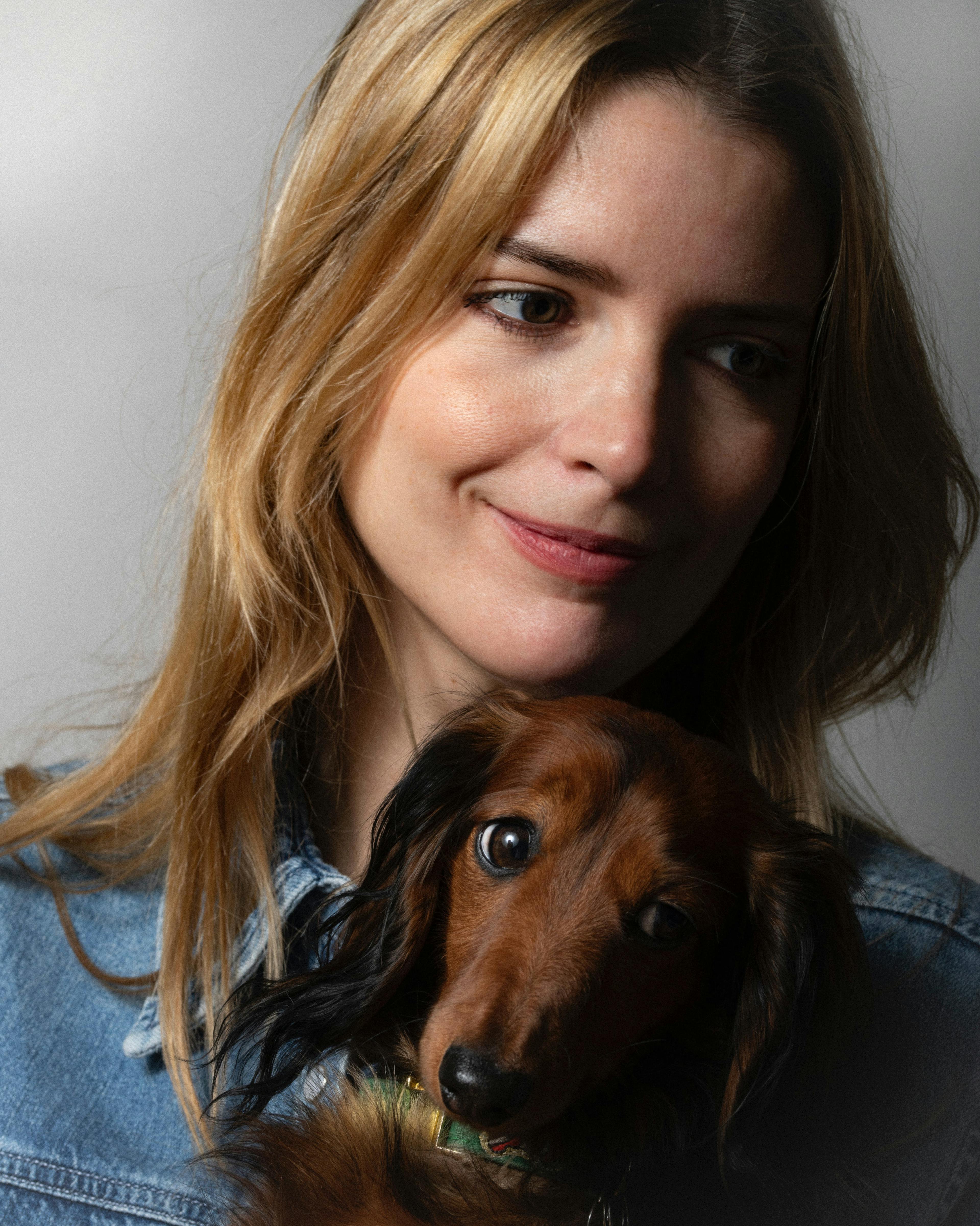 person woman adult female portrait face hound canine pet puppy