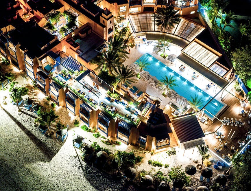building hotel resort pool water summer swimming pool outdoors city tree