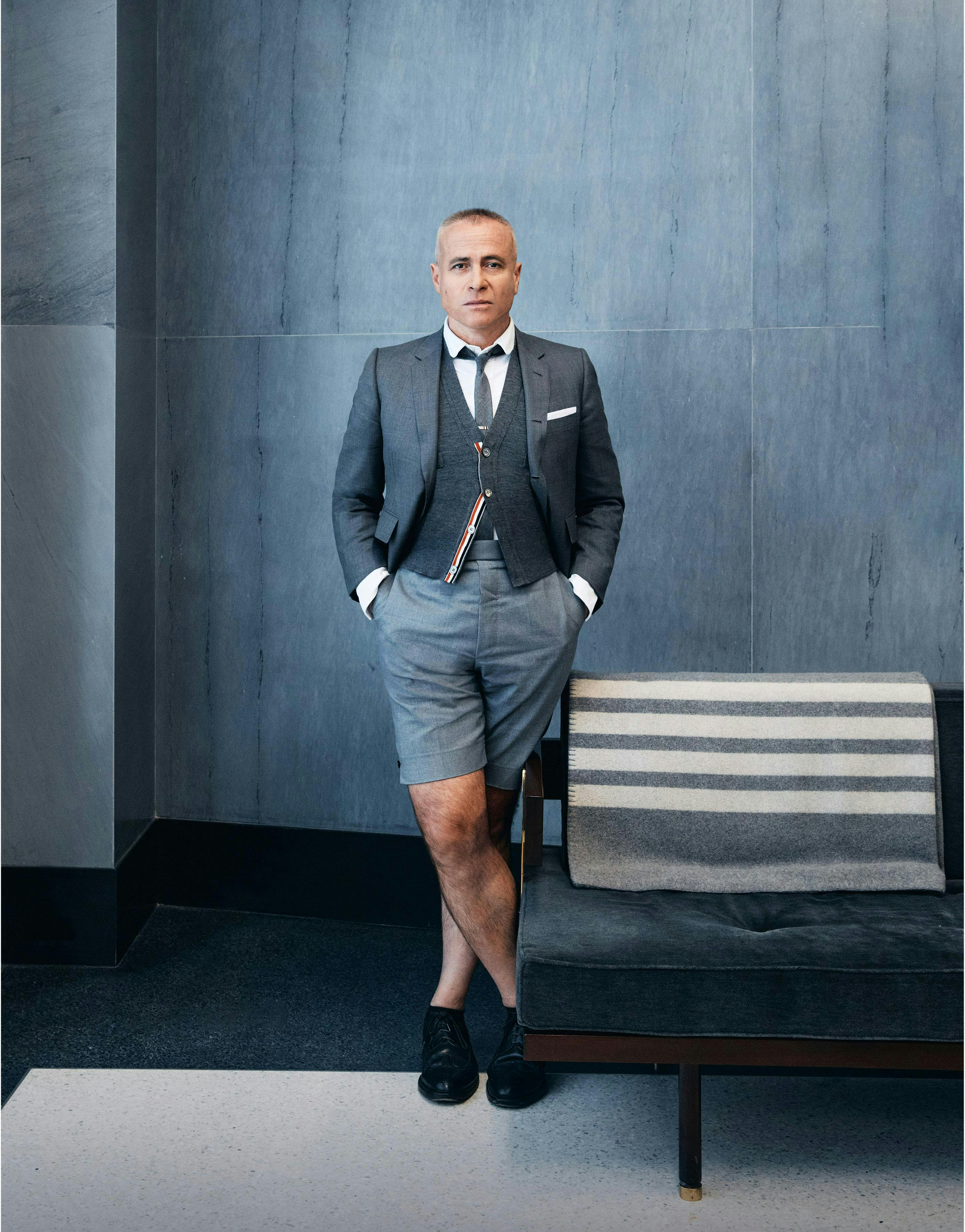 formal wear suit person standing blazer coat adult male man shoe