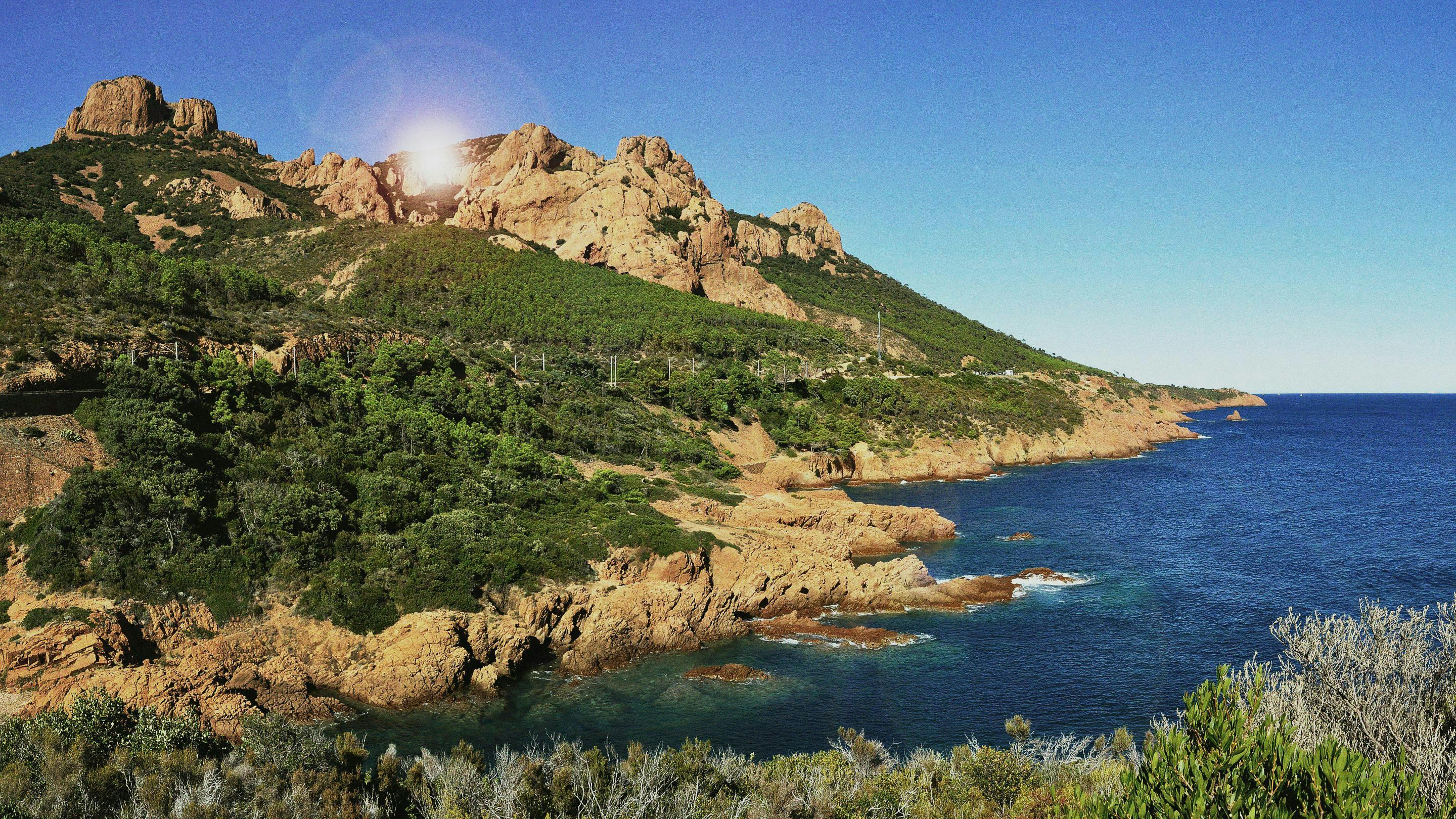 nature outdoors promontory water land scenery sea cliff shoreline coast